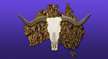 a dry cracking shape of Australian continent overlaid with a cow skull