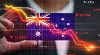 hand holding australian flag with downward trending arrows