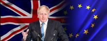 Boris Johnson in front of British and EU flags