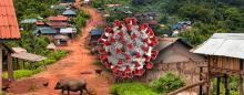 Laos village with coronavirus superimposed