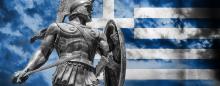 Ancient Greek soldier with modern Greek flag