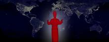 glowing red pope in front of world map